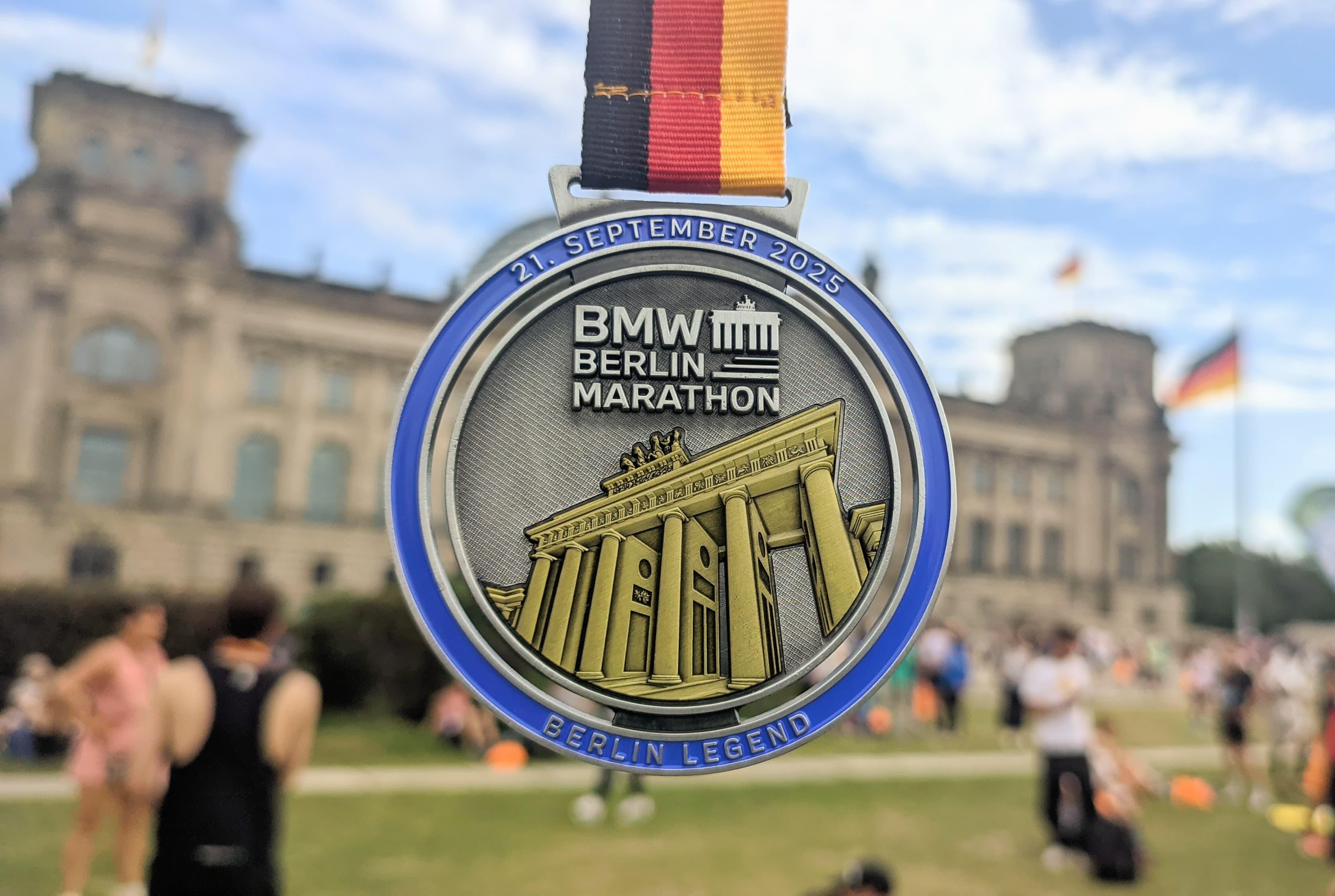Runners passing through the Brandenburg Gate at the finish of the Berlin Marathon, Pariser Platz, Berlin