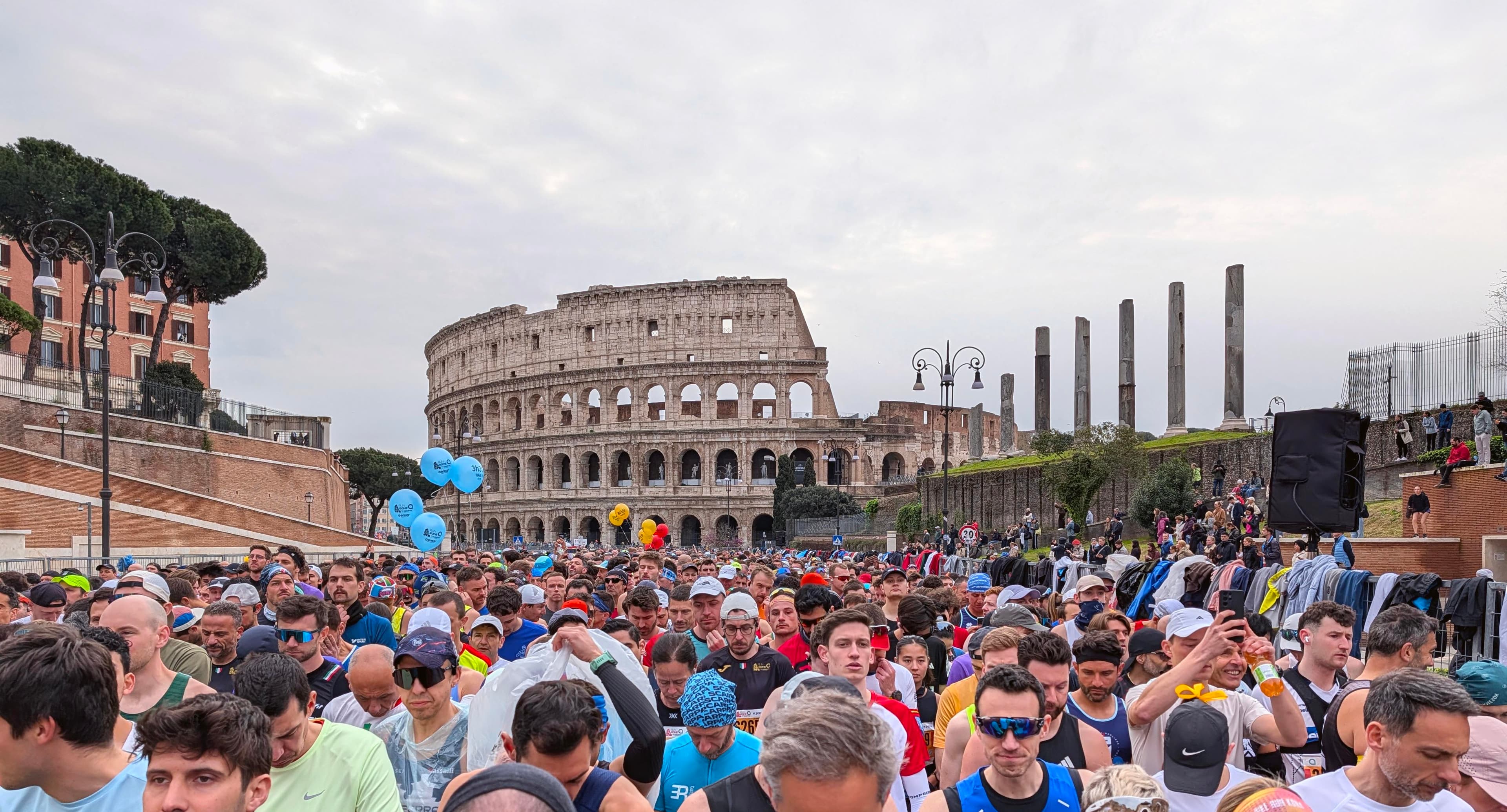 Runners passing the Colosseum during the Rome Marathon